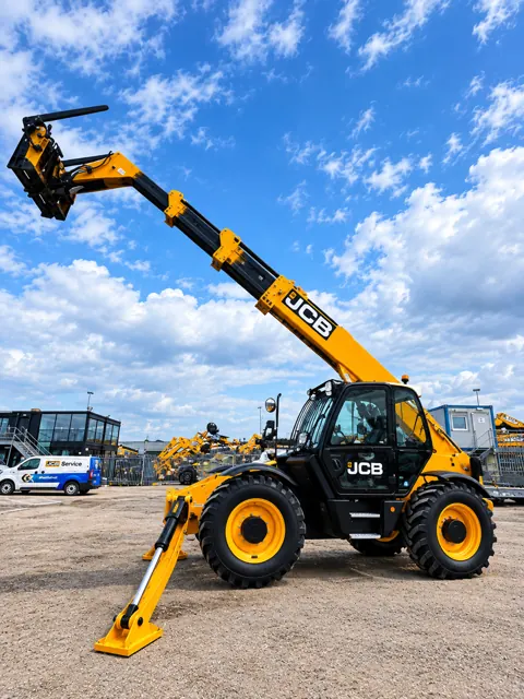 JCB telehandler with the boom extended, side view