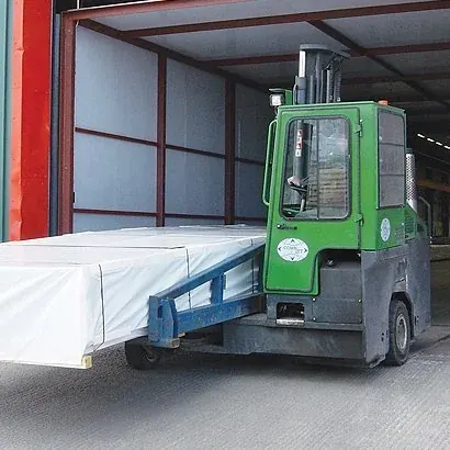 Combilift loading long panels from a container