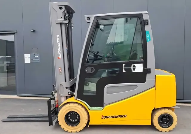 Jungheinrich electric forklift with an enclosed cab, side view