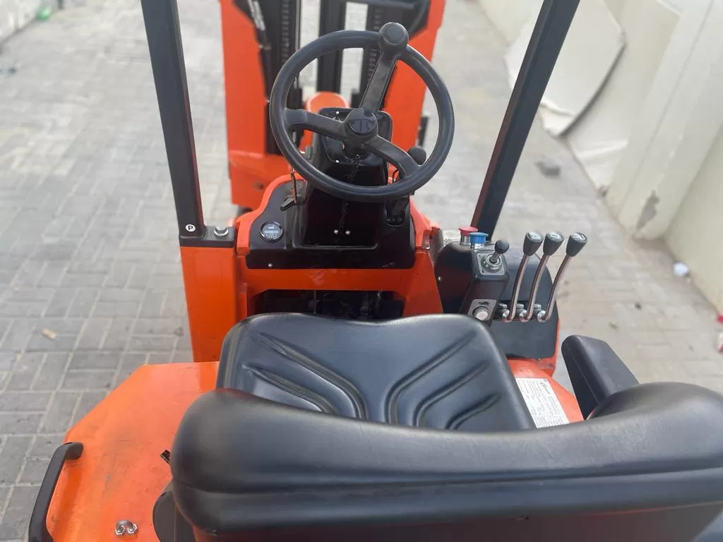 Forklift driver's seat and steering controls