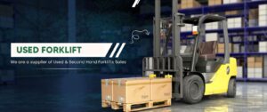 Forklift handling pallets in an industrial warehouse